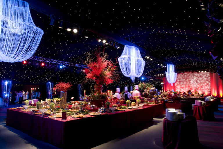 Christmas party buffet beneath a chandelier